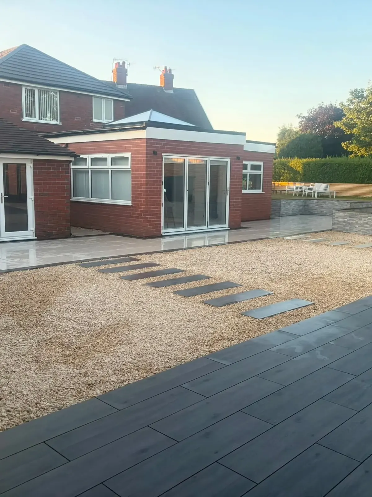 Gravel garden with porcelain paths and a newly laid patio